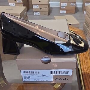 Clarks Women's Nyla 45 Jazz Black Patent Heels with Gold Accent